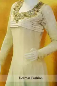 Beautiful embellished neckline with stone, kora, dabka and sequins. The triple tone anarkali has been implemented on silky pleats. Net Anarkali with silky three-tone lining.