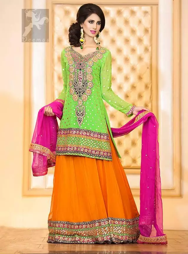 Best Dress for Mehndi having Bright Green Shirt With Orange Lehenga and Shocking Pink Dupatta