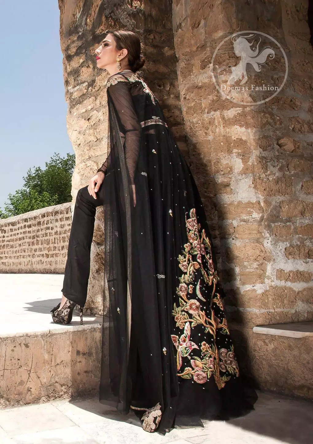 Black Party Wear Maxi. Embroidered borders are implemented on front slits.