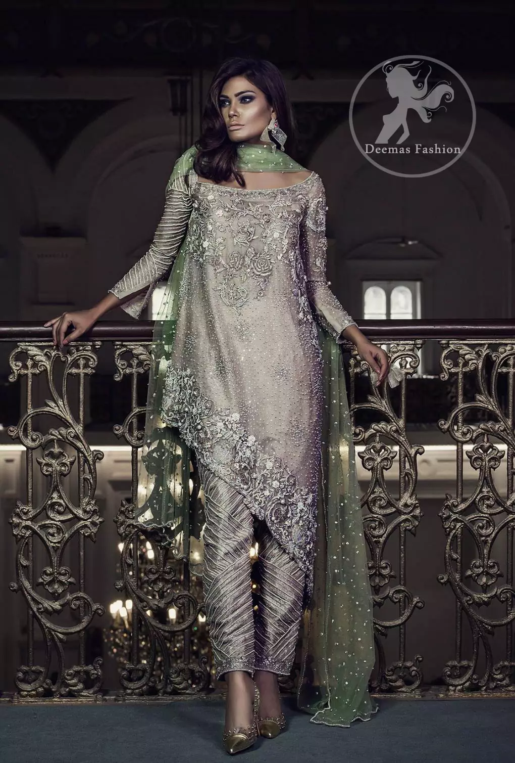 Features marvellous and awesome embellishments accent on the front. Full-length sheer Embellished sleeves and Concealed with back zip closure. Dupatta contains pearls and sequins sprayed all over.
