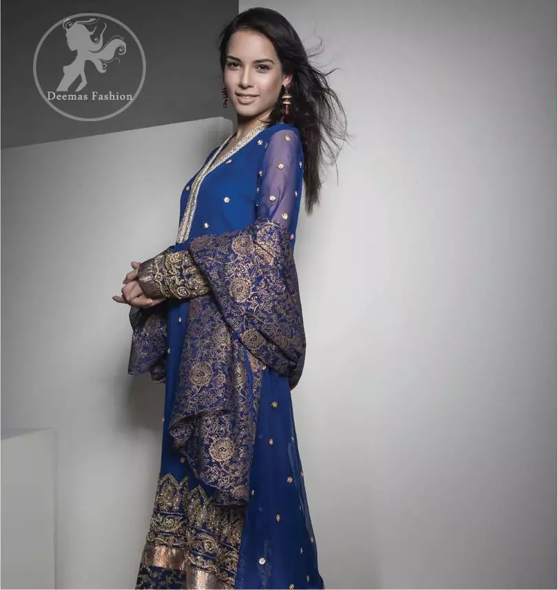 Royal Blue Embroidered Frock has been adorned with an embellished neckline. Frock contains a large embroidered border at the bottom.