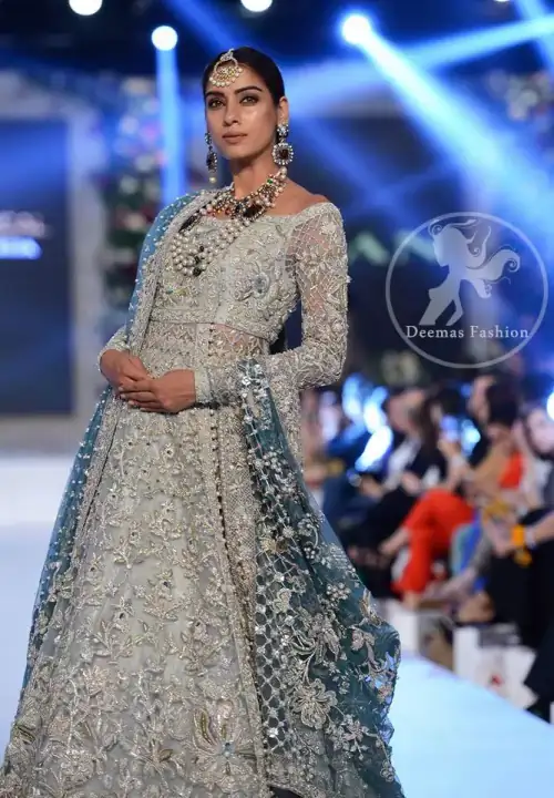 Silver Gray Bridal Frock. The frock features marvellous and awesome embellishments accenting all over the front and back Full-length sheer