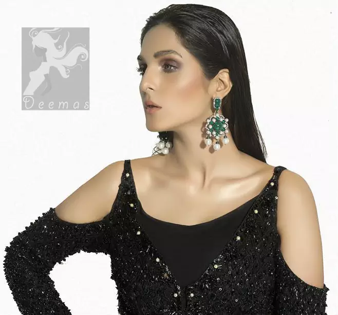 Black peplum having matching black embellishment all over peplum and trousers. Peplum comes with fully finished matching dupatta.