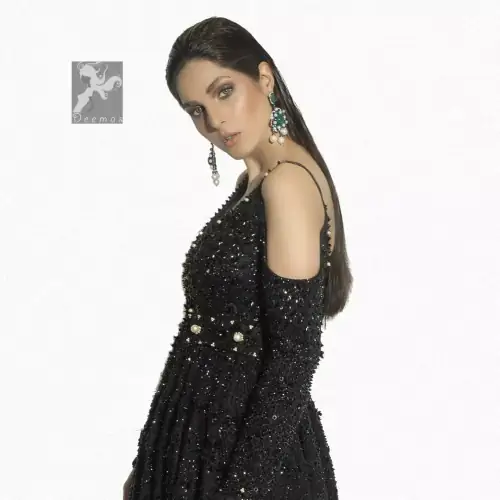 Black peplum having matching black embellishment all over peplum and trousers. Peplum comes with fully finished matching dupatta.