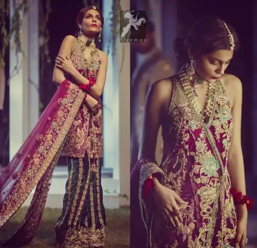 Claret colour peplum having halter neck design with bottle green loose trousers and heavy embellished Dupatta