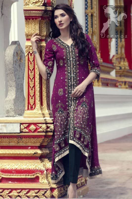 Dark purple front open back train gown. Gown having navy blue applique with silver embellishment. It comes with Navy blue churidar trousers and chiffon dupatta.