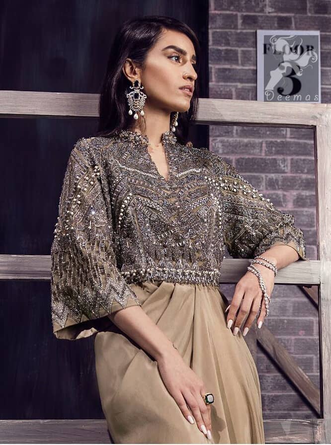 Fawn brown silky maxi has embellished bodice and sleeves. Bodice and sleeves have been embellished with dark gray embellishment and ivory pearls.