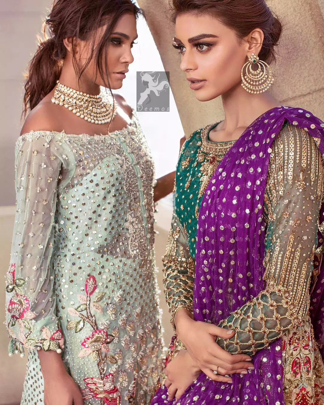 Sweetheart neckline pure crinkle chiffon shirt adorned with embellishment. Embellishment includes majorly light golden, silver, shocking pink and mehndi green shades. Shirt comes with embroidered sharara and net dupatta.