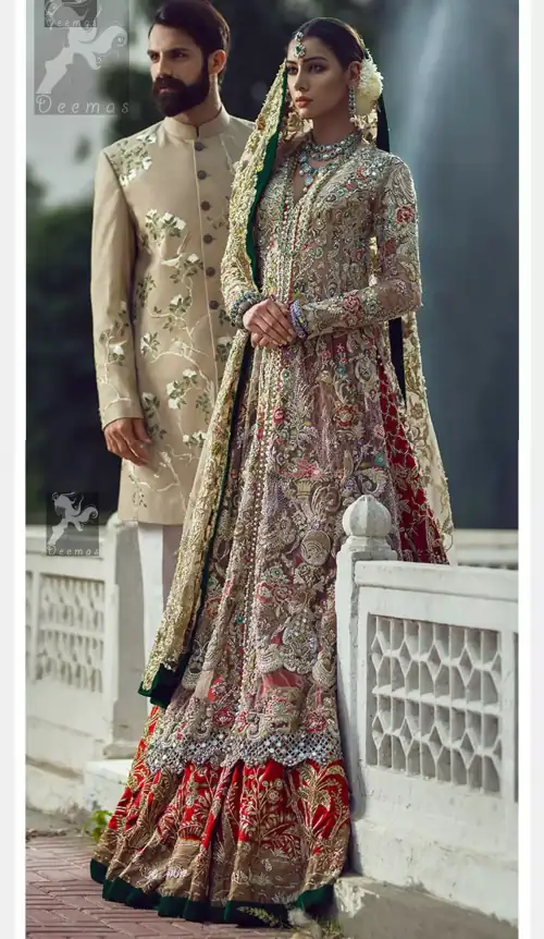 Light fawn pure crinkle chiffon front slits gown adorned with beautiful colorful embellishment. Red lehengha adorned with embellishment all over