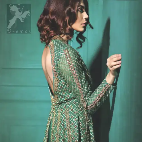 Party wear teal green peplum made with organza. Peplum having beautiful gold and antique hand embellishment. Peplum comes silky tulip