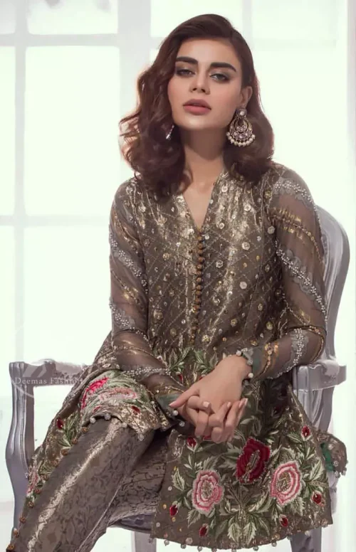 This classic dark gray peplum style back trail is meticulously highlighted with dull golden, gray, antique shaded kora, dabka, tilla,