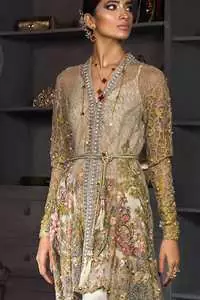 This open short frock is decorated with resham thread, kora, dabka, tilla, sequins and pearls. It is self embroidered shirt embellished with floral thread embroidery. It is further enhanced with embroidered scalloped border which adds to the look. It comes with pants. It is beautifully coordinated with chiffon dupatta which is sprinkled with sequins all over.
