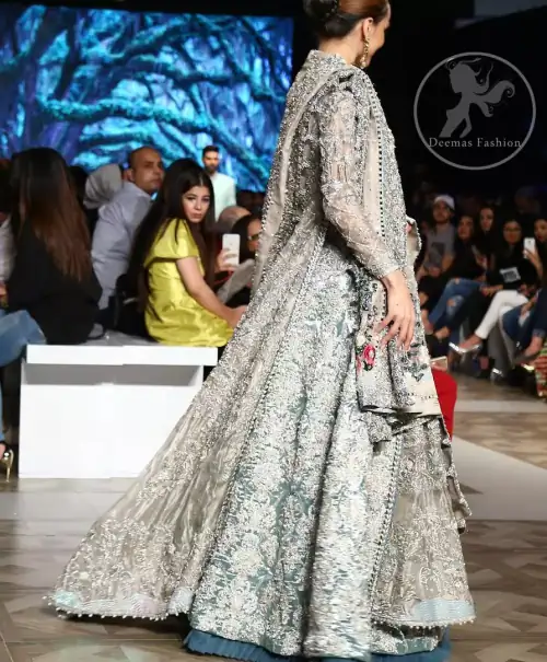 This outfit is a timeless beauty. It is heavily embellished with silver gold kora dabka, Sequins and swarovski crystals. This