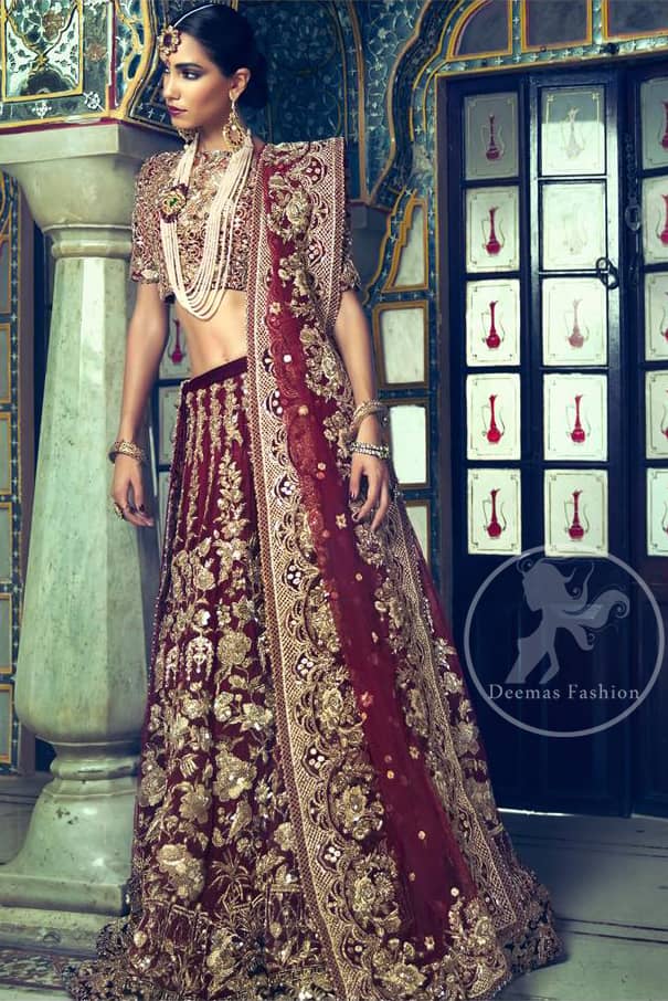 This outfit is meticulously highlighted with antique shaded kora dabka, tilla, sequins and swarovski. This dress is beautifully sculptured with floral embroidery. Shirt is fully embellished. It is artistically coordinated with embellished lehenga. Lehenga is enhanced with floral motifs and fully fully embellished with kora dabka embroidery. It comes with chiffon dupatta, having four sided embellished border and sprinkled with sequins all over it.