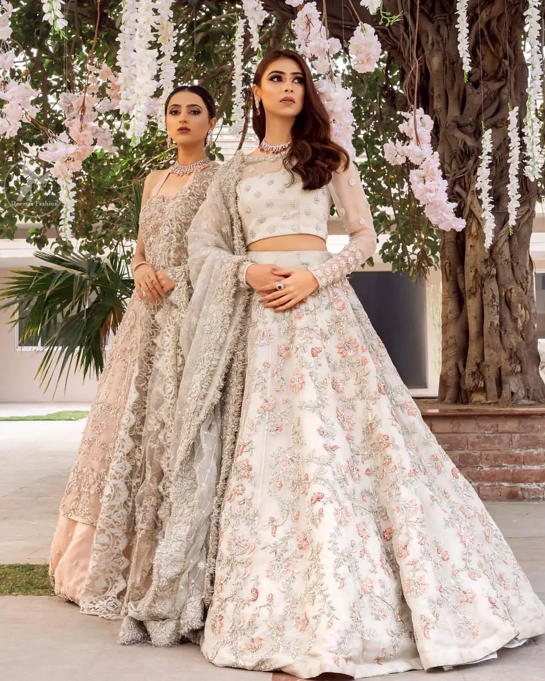 This super stunning skirt is made of rich floral embroidery which is further enhanced with kora dabka work. Blouse is meticulously embellished from neckline and sprinkled floral motifs on ground. It is paired up with ivory dupatta embellishment on sides which looks so breathtaking elaborate it with crisscross lines.