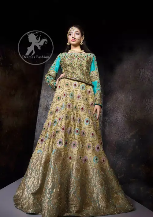 This outfit is adorned with kora, dabka, tilla, sequins and pearls. It is decorated with heavy floral embellishments. It comes