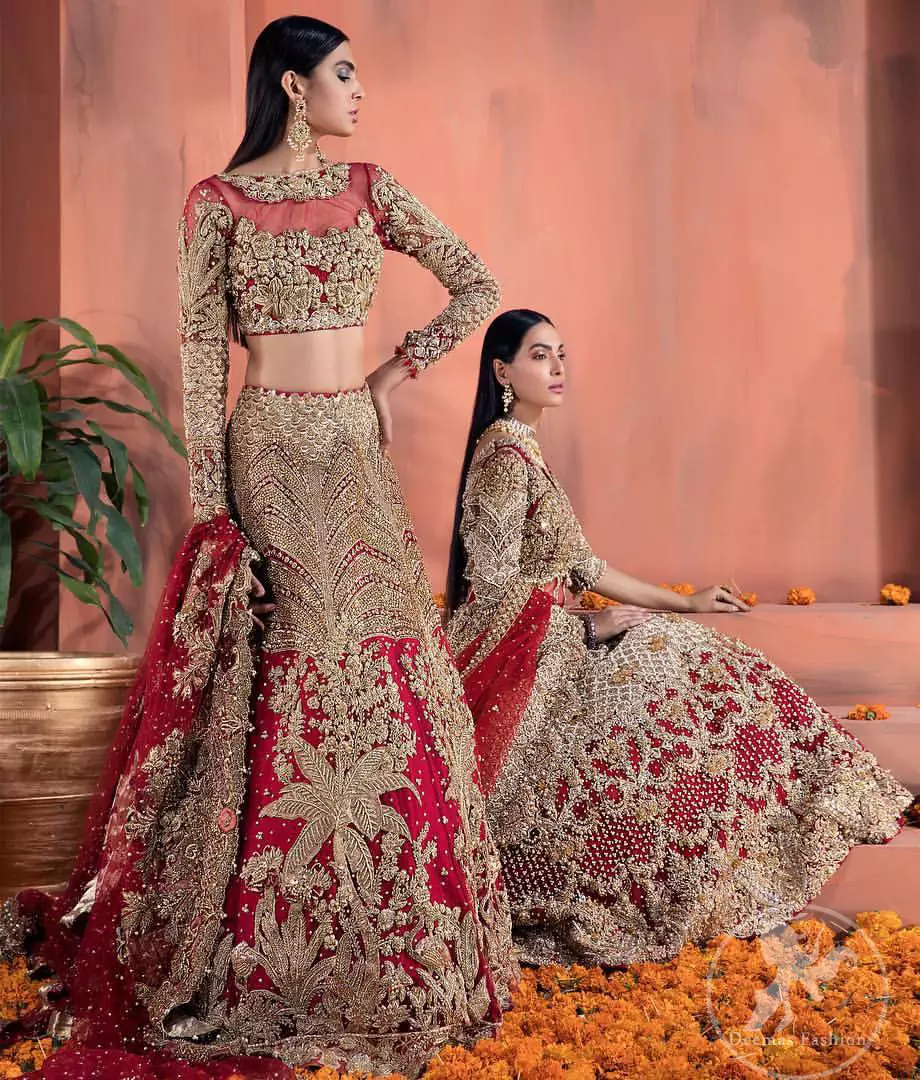 Reflecting royalty and the majestic beauty of statuesque shape and silhouette this bridal dress is perfect for your special day. This traditional outfit is aesthetically designed with motifs and floral patterns, embellished with kora, dabka, nakshi, sequins, crystals and stones. The back of the maxi also adorned with floral motifs in kora, dabka with sequin spray all over. It comes with brocade pajama. It is paired with heavily embroidered organza dupatta that gives the right amount of glamour to the outfit.