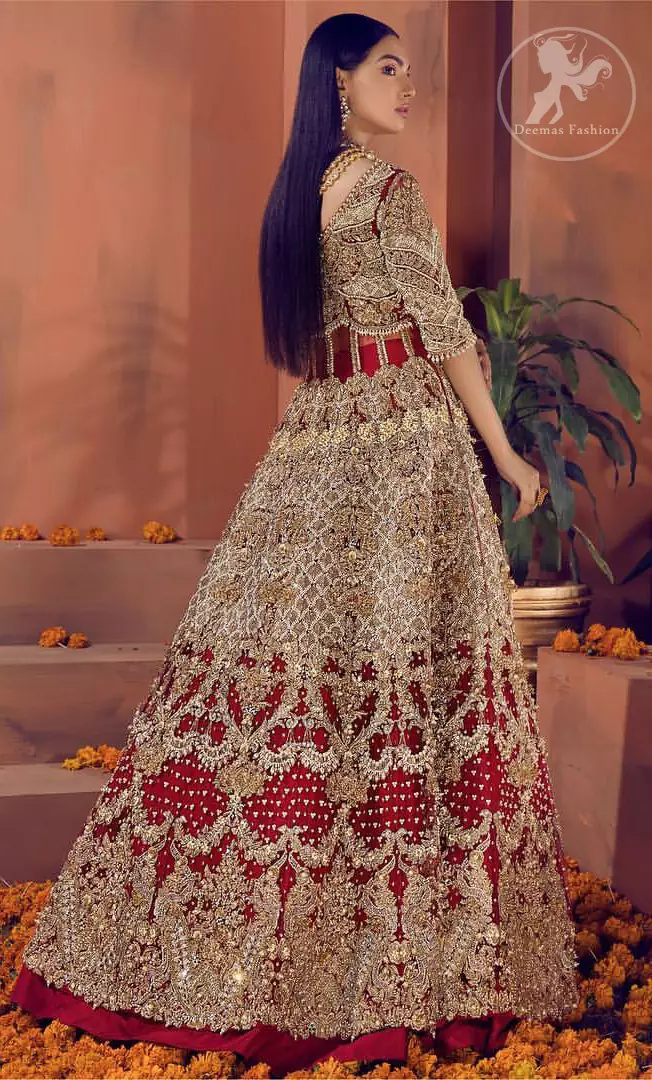 Reflecting royalty and the majestic beauty of statuesque shape and silhouette this bridal dress is perfect for your special day. This traditional outfit is aesthetically designed with motifs and floral patterns, embellished with kora, dabka, nakshi, sequins, crystals and stones. The back of the maxi also adorned with floral motifs in kora, dabka with sequin spray all over. It comes with brocade pajama. It is paired with heavily embroidered organza dupatta that gives the right amount of glamour to the outfit.