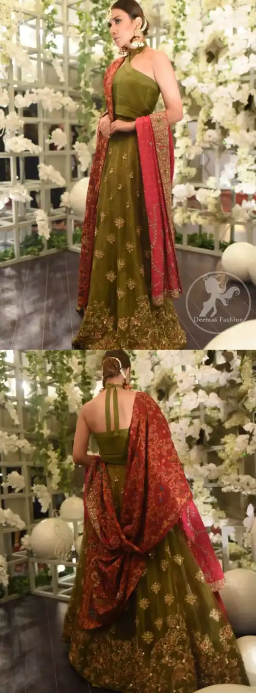 This dress is beautifully decorated with heavy embroidery. It is highlighted with dull golden kora, dabka, tilla, sequins and pearls.