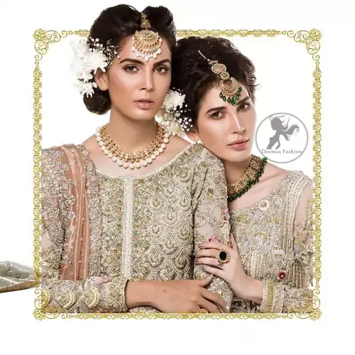 The perfect combination of tradition and class. Dazzle in this made to perfection, richly embroidered front open net outfit decorated