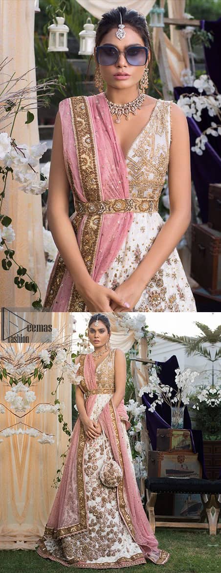 This dress is majestic beauty and perfect for your engagement or evening ensemble. Delicately crafted and personifying chic elegance with an element of grandiose. This floor length maxi is decorated with intricate thread and kora, dabka embroidery on bodice and floral motifs details all over the front on ivory canvas. The bottom of the maxi is enhanced with embellished applique. It comprises with churidar pajama. It comes with net dupatta with embellished border at all ends. Style it up with embroidered waist belt.