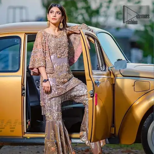 Tradition meets modernity. This outfit is stunningly perfect for any evening ensemble. This dress is beautifully sculptured with floral embroidery,