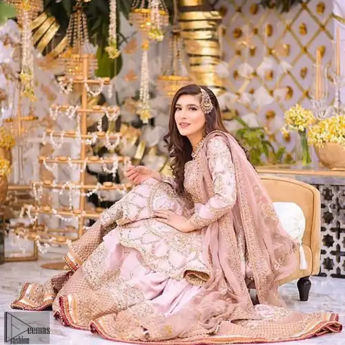 Brighten up your look with this outfit on your reception or nikah day. Wear this soft and supple hues richly