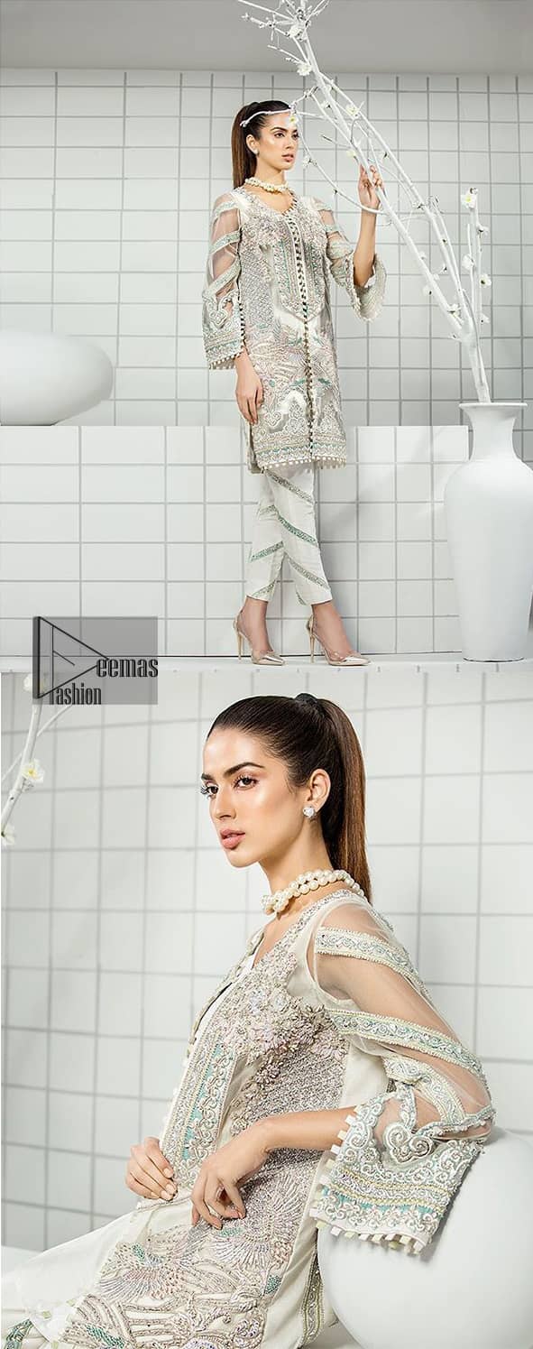 This formal wear dress is majestic beauty. Delicately crafted and personifying chic elegance with an element of grandiose. A full heavily embroidered front open shirt with silver zerdozi work details all over. The daaman is furthermore highlighted with embellished border. Having full length sleeves adorned with silver kora, dabka and tilla embroidery. Paired up with organza straight trouser decorated with embroidered lace. It comprises with chiffon dupatta having sprinkled sequins on the ground.