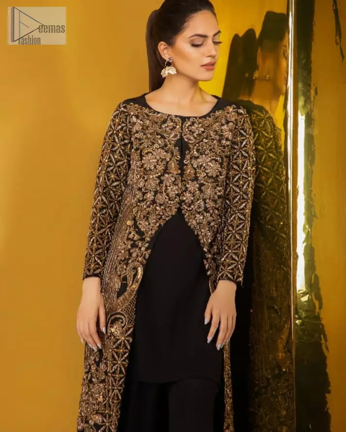 Perfected with antique gold and dark antique embellishments this black velvet ensemble is timeless masterpiece in to a chic fantasy. Delicately crafted with zardosi, kora, dabka, tilla, sequins and pearls. Furthermore it is adorned with geometric patterns all over.  Beautifully designed sleeves is an amalgamation of geometric and floral design elements. This outfit is finished with black raw silk palazzo pants and pure chiffon dupatta.