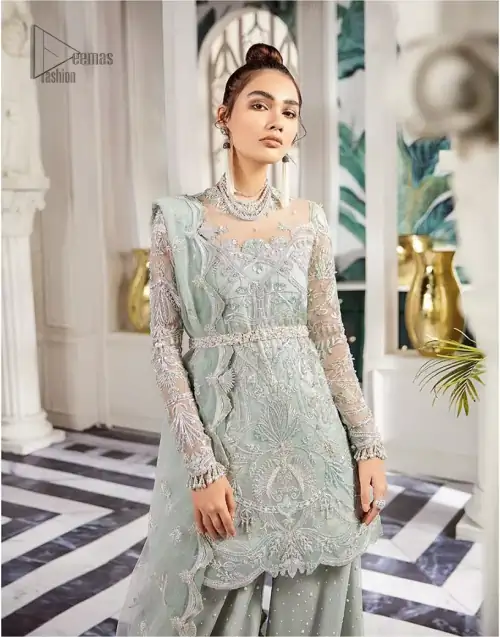 Delicately crafted and personifying chic elegance with an element of grandiose. This outfit is aesthetically designed with motifs and floral