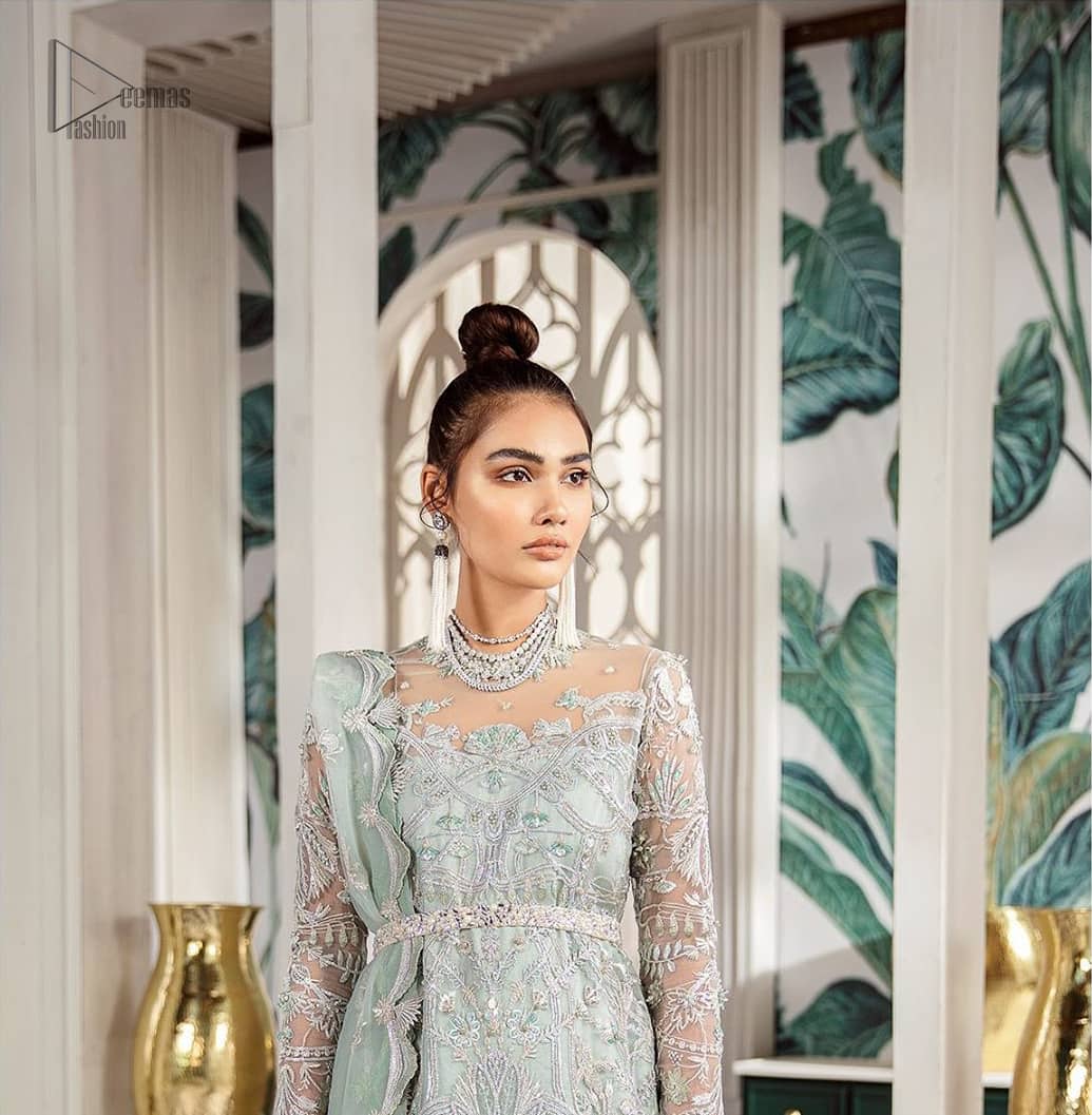 Delicately crafted and personifying chic elegance with an element of grandiose. This outfit is aesthetically designed with motifs and floral patterns, embellished with kora, dabka, nakshi, sequins, cutdana and crystals. The detailed scalp border gives a perfect ending to this peplum. Beautifully designed sleeves is an amalgamation of floral design elements. Sharara comprises of sequins spray all over. The dupatta incorporates beautifully designed scalloped borders on all four sides and tiny floral motifs.