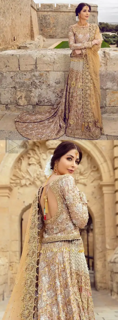 Strike a breathtakingly elegant pose in this wedding dress, designed with a beautiful blouse and a dramatic train. This artisan