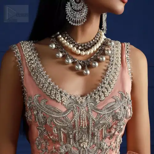 Crafted with love. This outfit is classically designed to make your memorable day beautiful as it should be. The peachy