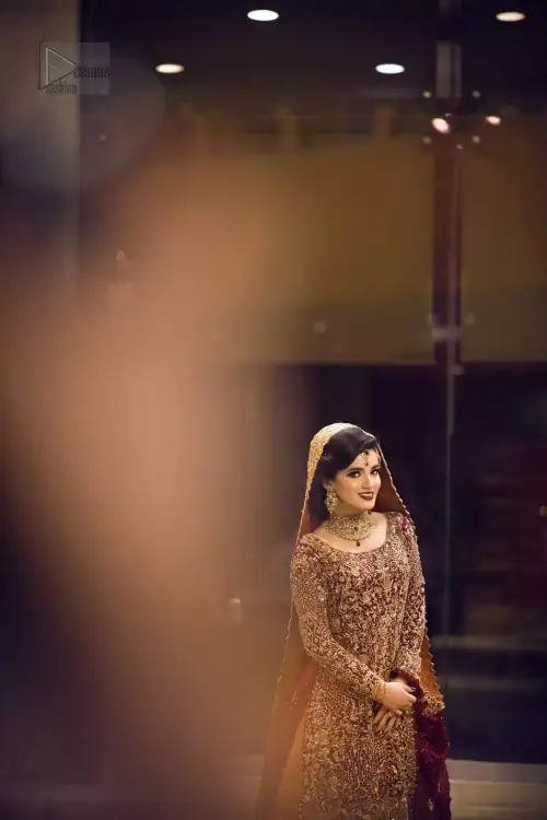 Pakistani Reception Wear - Maroon Shirt – Rust and Maroon Lehenga. You are all set to make a lasting impact