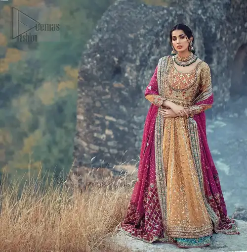 This exceptionally detailed anarkali frock is cut in a seductive fit and flare silhouette that’s sure to turn heads. The