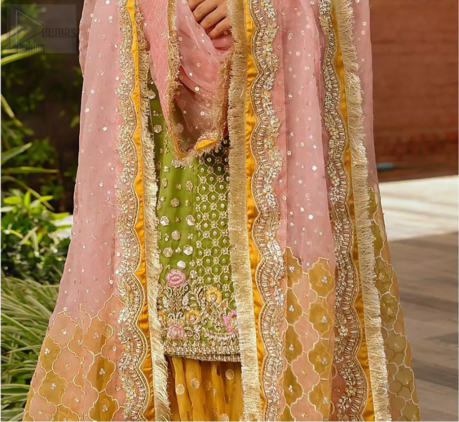 We have brought a charismatic charm to the traditional motifs and cuts. Our embroidery is rich in detailed traditional techniques executed to perfection. The bride shines bright in this outfit, embedded with sophisticated zardozi and thread embeishments. The bodice and hemline is furthermore emphasized with intricate details that gives the perfect ending to this mehndi dress. Pair it up with yellow sharara with captivating embellished border. The dupatta incorporates beautifully designed borders with zardozi, applique and kiran along the length, focusing on the geometrically embellished pallu and sequins spray all over to give it a perfect look.
