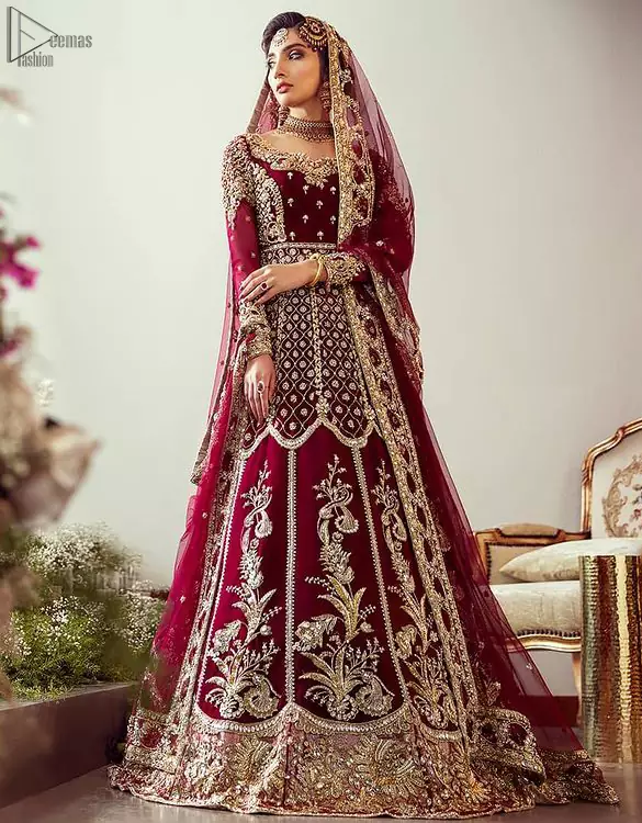 The pishwas is fully decorated with geometric patterns, floral bootis and tea rose embroidered appliqued bottom. It is paired with an ethereal bridal dupatta focusing on kora and dabka handwork borders on all four sides, finishing with scattered tiny floral motifs on the ground.