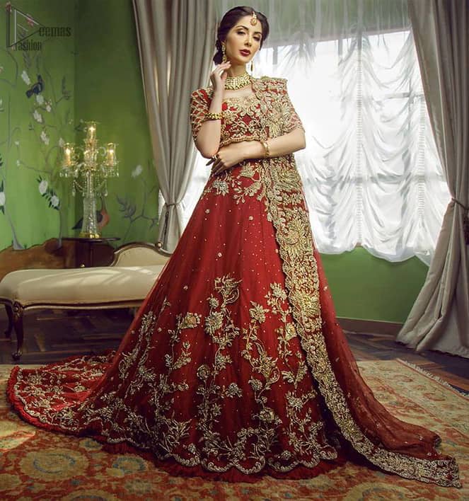 This signature Blouse and lehenga crafted with Velvet featuring hand embroidery with elegant zardozi work. Modern yet traditional.