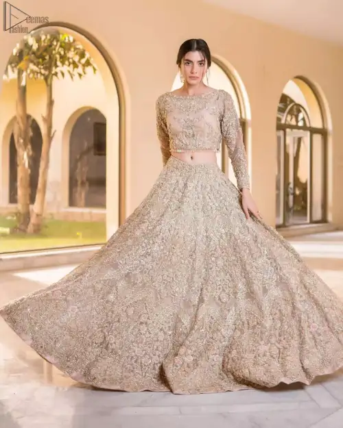 Picturing your bridal in a tea rose colour? This subtleness laden with ornamental embellishments and embroidery creates such a fairytale