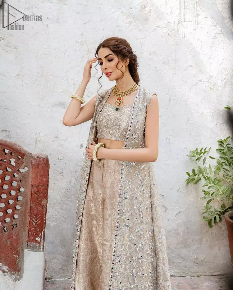 Pakistani Party Dress - Beige Open Shirt n Blouse - Palazzo Pants. The dress is made with pure Katan Banarasi Jamawar that comes with a magnificent net choli followed by the perfect palazzo pants.