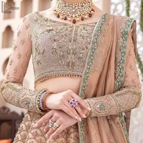 Pakistani Wedding Wear Peach Blouse Lehenga. DupattaThis breathtaking fit and flare wedding dress offers comfort without compromising on style. This