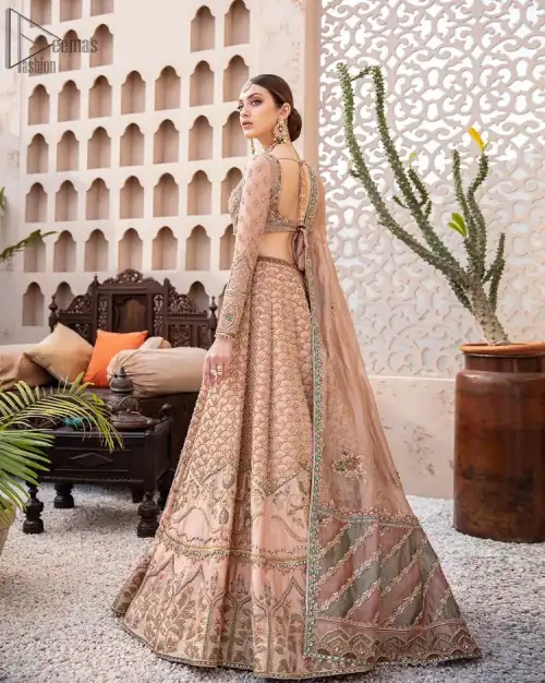 Pakistani Wedding Wear Peach Blouse Lehenga. DupattaThis breathtaking fit and flare wedding dress offers comfort without compromising on style. This