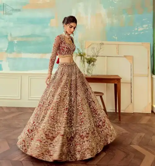 Come up with something fab on your wedding day, with a meritorious Red Lehenga Blouse. A full-sleeved attire made with
