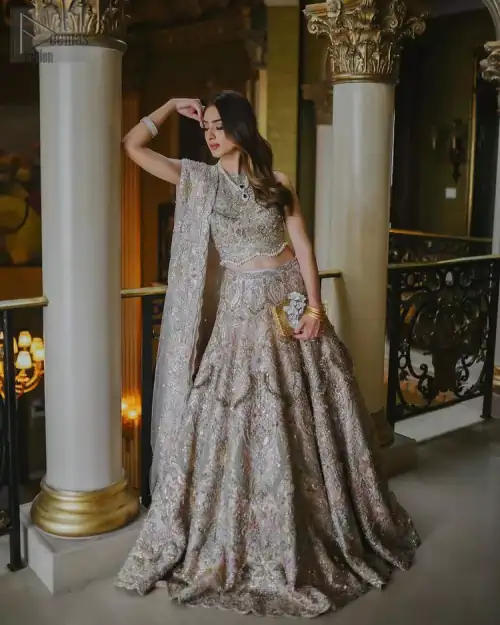 Contributing even more to its awesomeness, the dress is adorned with tassels and a marvellous work of multicolour embroidery.