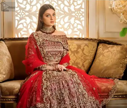 attire displays a skilful work of outstanding sculptured light golden embroidery. Enhancing its elegance, even more, pure organza is the