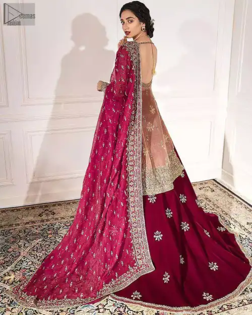 In order to enhance the beauty even further, a traditional, yet mesmerizing golden embroidery initiates below its marvellous V-Neckline.