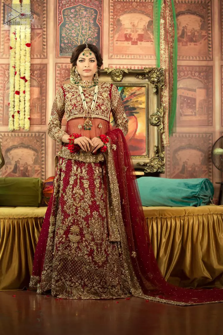 A little blend of the traditional and western styles doubles the gorgeousness of the Red Short Shirt Lehenga. A dress with such dexterity that it holds the magic towards a gorgeous wedding day. Its can-can style and cultural styled full-sleeves are indeed a contribution to the overall exceptional beauty of the dress. Purest organza as the most graceful as well as the comfortable fabric is chosen by our professional designers for this highly ravishing attire. As per the dress’s need, a boat-shaped neckline appears admirable, while the exceptional work of golden embroidery assures you of the lots of attraction you’ll receive on your Reception day.
