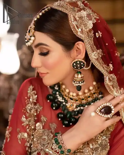 Take your style up a few notches with this bold yet elegant piece on your Big day. This red full