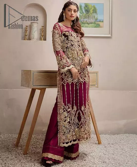 Take a step towards refreshing your wardrobe with a Shocking pink long Shirt. This dress is allured with floral embroidery. It is further enhanced with kora, dabka, kundan, sequins and pearls. It comes with raw silk trousers and enhances the art of classical heritage showcasing the craftsmanship of zardozi work on the bottom. Artistically embellished to give a beautiful rhythm to the outfit. This outfit is a perfect choice for daylight but equally breathtaking for night events.

