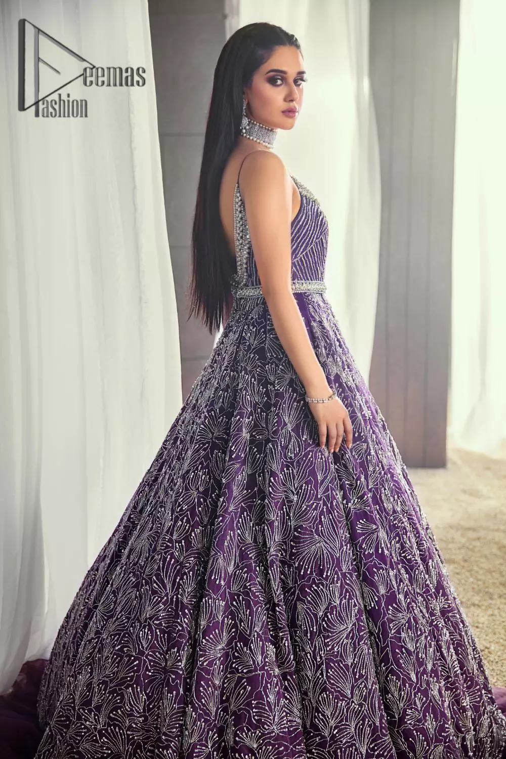 Style with an unparalleled ravishing, by picking the right dress for you. Evening parties being full of entertainment are maxed up with gratification if your dress wins you the most admirers. This sleeveless Purple Frilled Maxi has the magical features to make you an evening star. Decorated with silver embroidery, and  its stunning boat-shaped neckline suits its highly enchanting silver embroidery. This Maxi is designed from 100% pure Organza Stuff that gives you artistic look on your event.